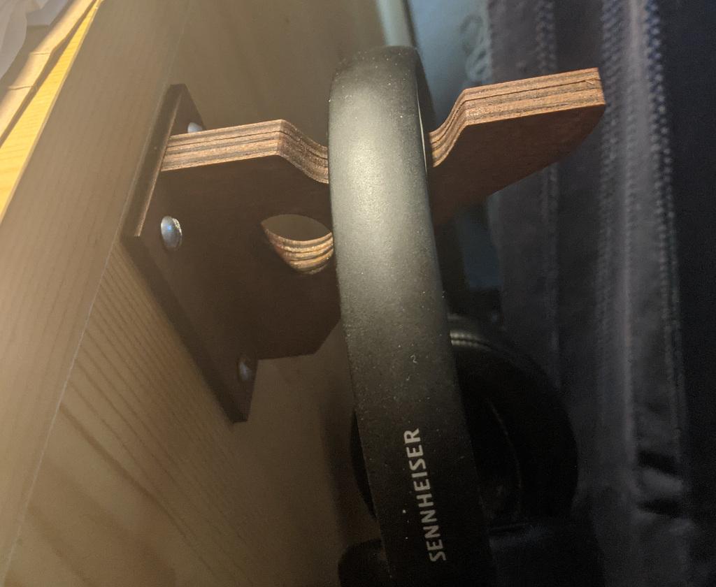 Headphone holder attached to desk